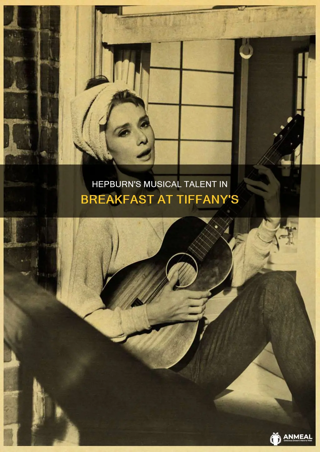 did audrey hepburn play the guitar in breakfast at tiffany