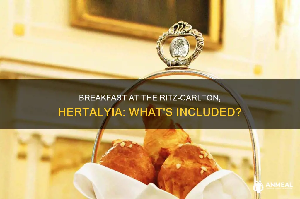 does ritz carleton in hertalyia include breakfast