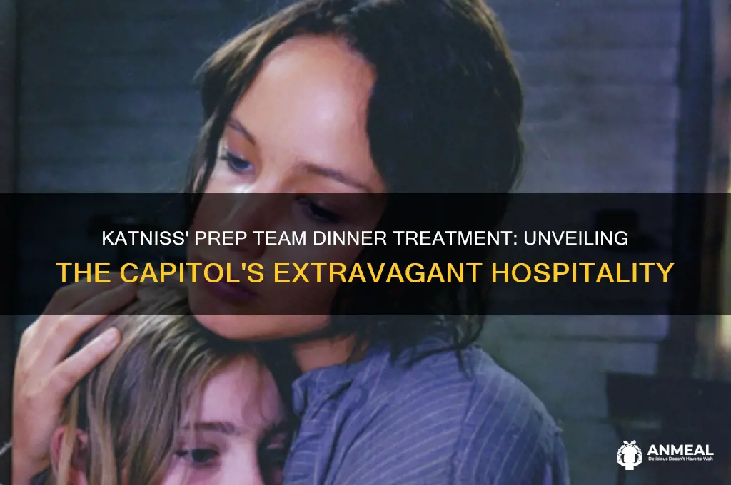 how was katniss prep team treated at dinner