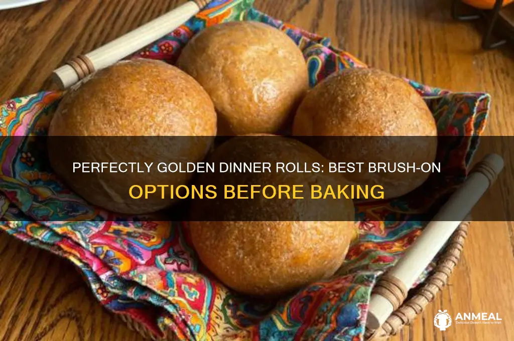 what do you brush dinner rolls with before baking