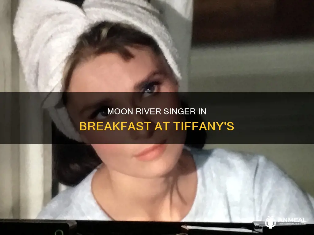 who sang moon river in breakfast at tiffany