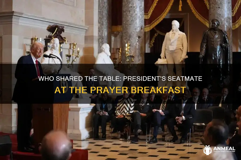 who sat next to president at prayer breakfast