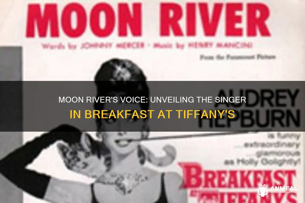 who sings moonriver in breakfast at tiffanys