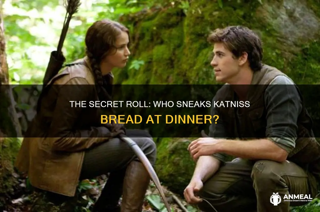 who sneaks katniss a roll at dinner